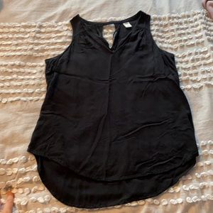 Sleeveless black cotton blouse